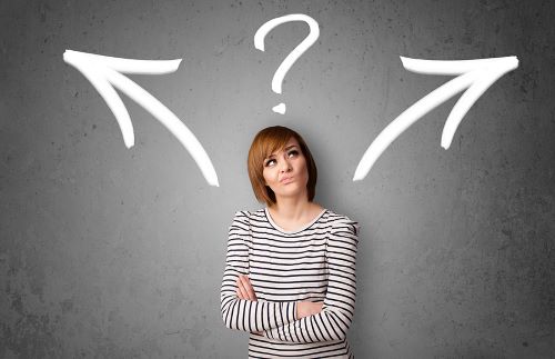 Woman making a decision with arrows and question mark above her head