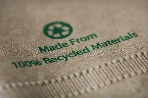 A paper napkin with the words Made From 100% Recycled Materials